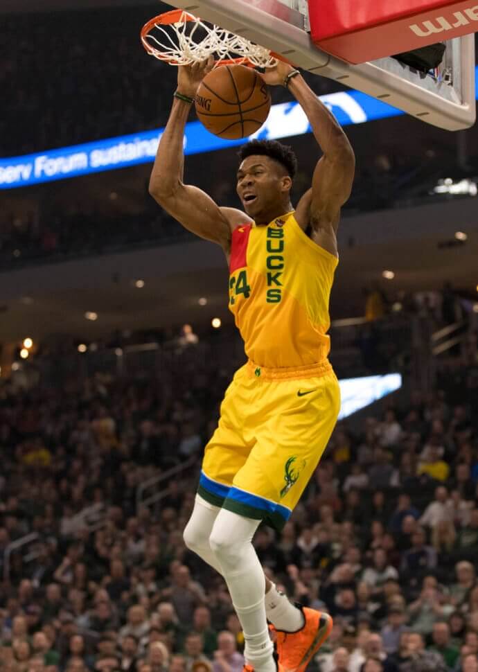 Milwaukee Bucks forward Giannis Antetokounmpo (34) dunks the ball at Fiserv Forum