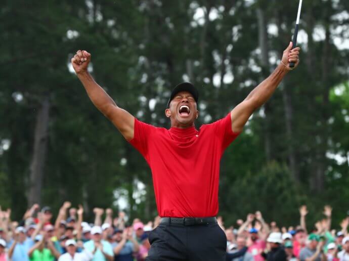 Tiger Woods celebrates winning The Masters golf tournament at Augusta National Golf Club