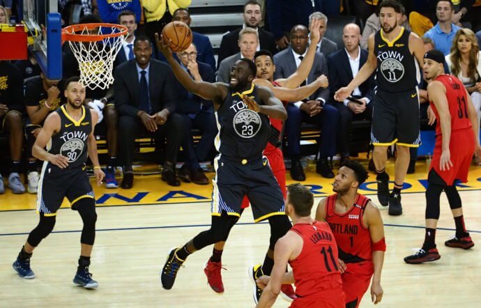 Golden State Warriors forward Draymond Green (23) goes for a layup against the Portland Trail Blazers