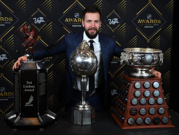 Nikita Kucherov with the Ted Lindsay award, Art Ross trophy and Hart trophy 